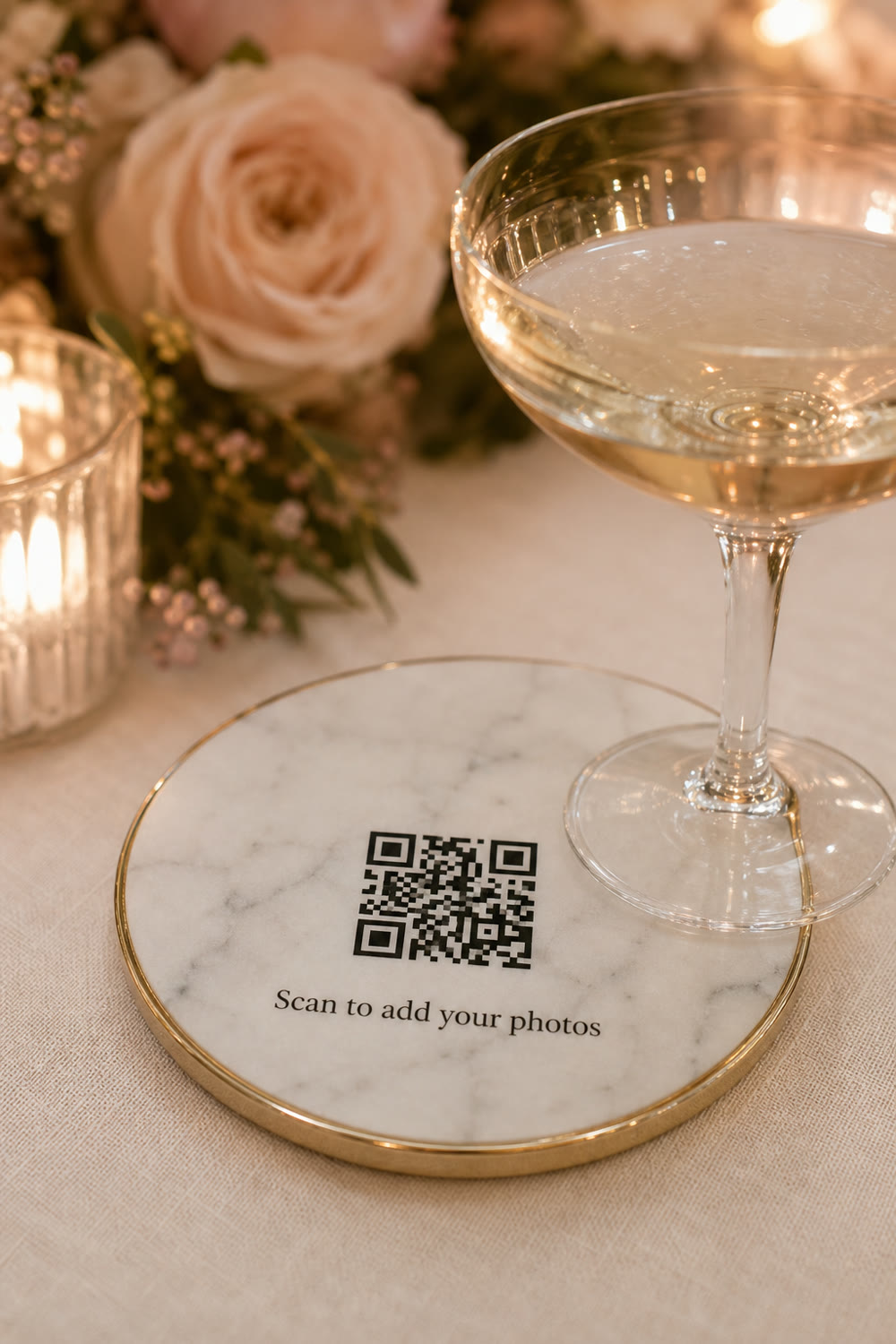 A wedding QR code on a marble drink coaster